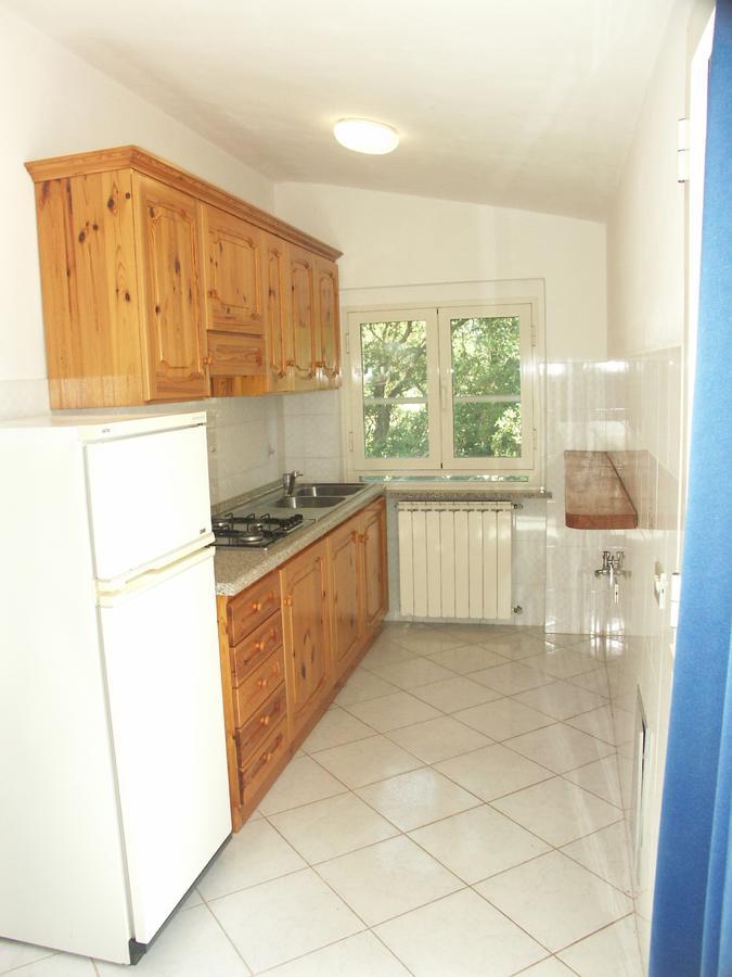 Appartamenti Gli Alberi กาโปลิเวรี ภายนอก รูปภาพ